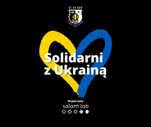 The centre of the graphic features a heart; half of it is yellow, and the other half is blue. Black background. The white inscription translates into English as: “Stand with Ukraine”.