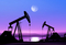 The photo shows two oil pumps working in a deserted district under the moonlight.
